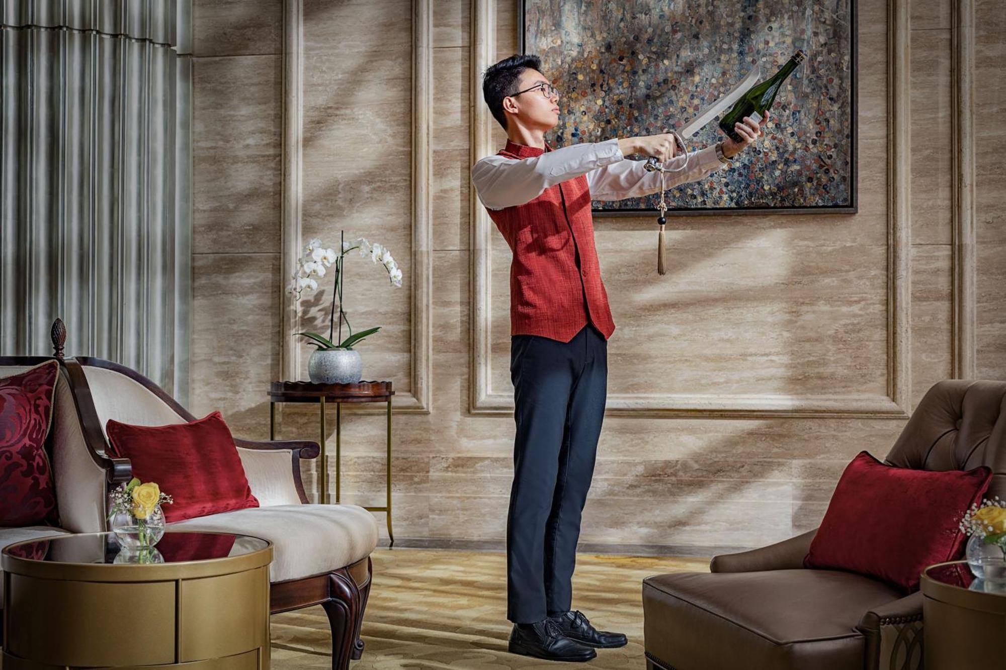 The St. Regis Abu Dhabi Hotel Exterior foto A butler at The Ritz-Carlton, Hong Kong